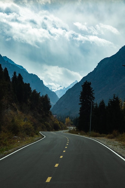 Road to the mountains, the view from the cab of the car