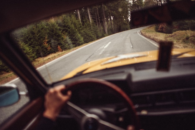 Road seen through car windshield