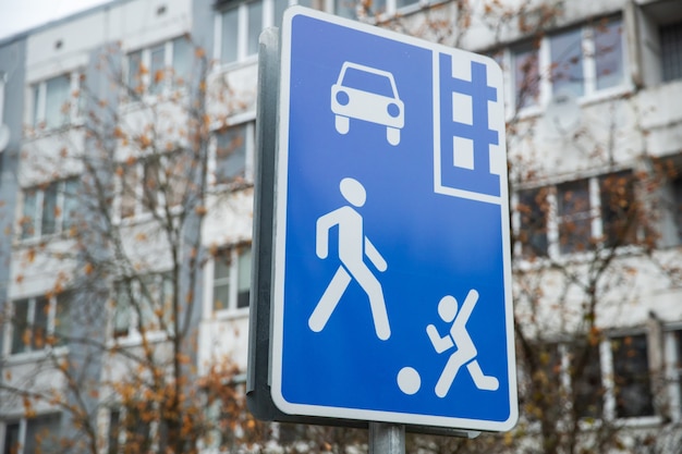 Road sign in blue on the city street. Pedestrian zone