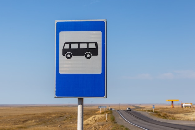 Road sign bus stop on the highway in Kazakhstan