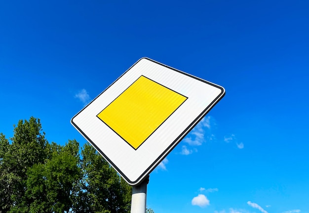 Road sign Main road on a blue sky background with copyspace