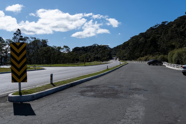 Road to Teresopolis Rio de Janeiro Brazil Mountain region of the state Signposts cars on the highway Region with a lot of nature Sunny day