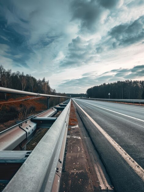 Photo a road with a bridge that has a sign that says  no cars