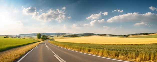 a road with a fence and a field of grass