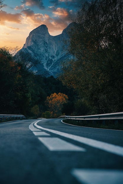 A road with a mountain in the background pedraforca mountain