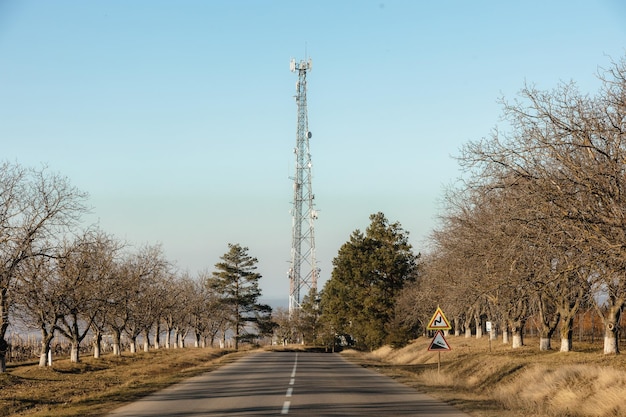 A road with a sign that says'cell tower'on it