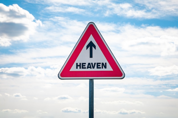 Roadsign with an arrow inside pointing to heaven