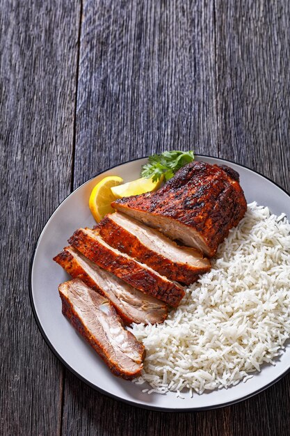 Photo roast baby back pork meaty ribs with basmati rice