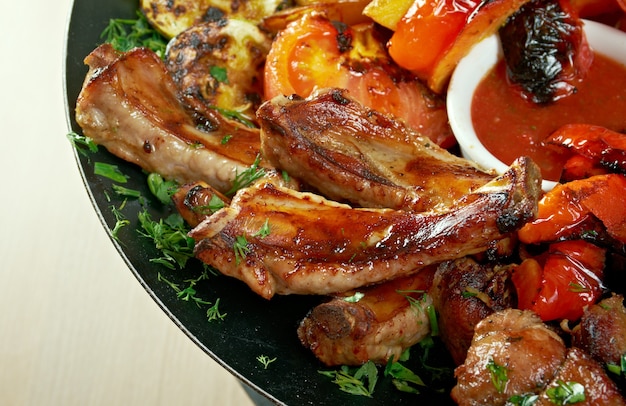 Roast meat lamb on rib  with vegetables