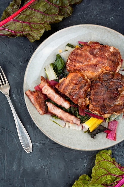 Roast meat steak with a vegetable garnish