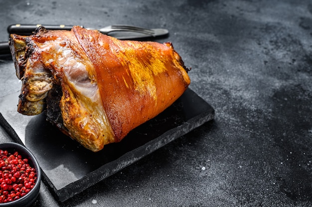 Roast pork knuckle with pepper and spices