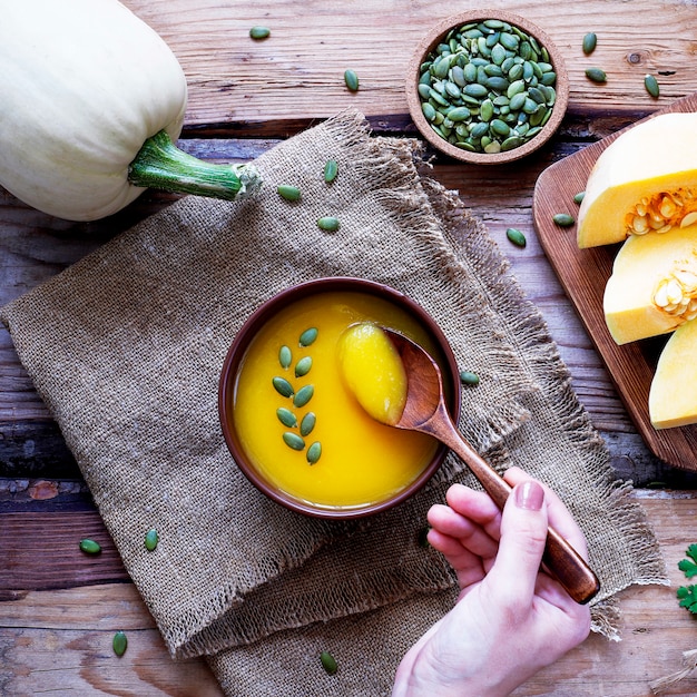 Roasted butternut squash cream soup with pumpkin seeds