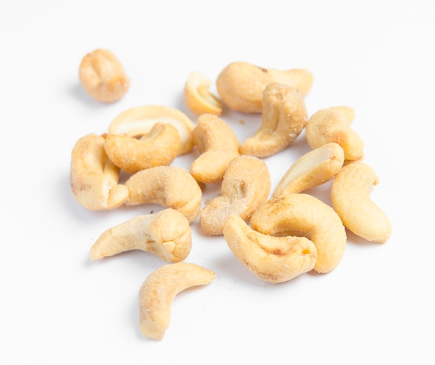 Roasted cashew nuts isolated on white background