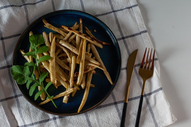 Roasted chargrilled green beans with fresh arugula