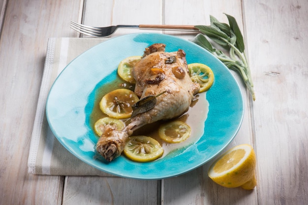 Roasted chicken leg with lemon sauce