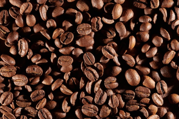 Roasted coffee beans macro close up background