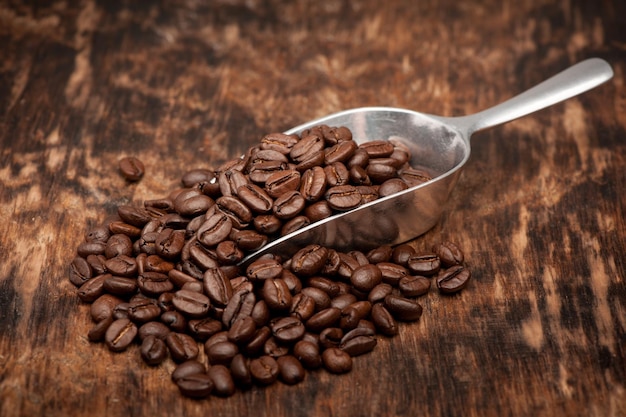 Roasted coffee beans scoop