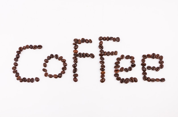 Roasted coffee beans on white background