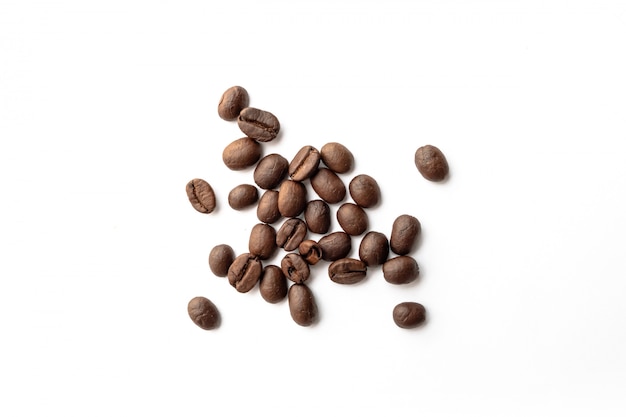 Roasted coffee beans on white background.