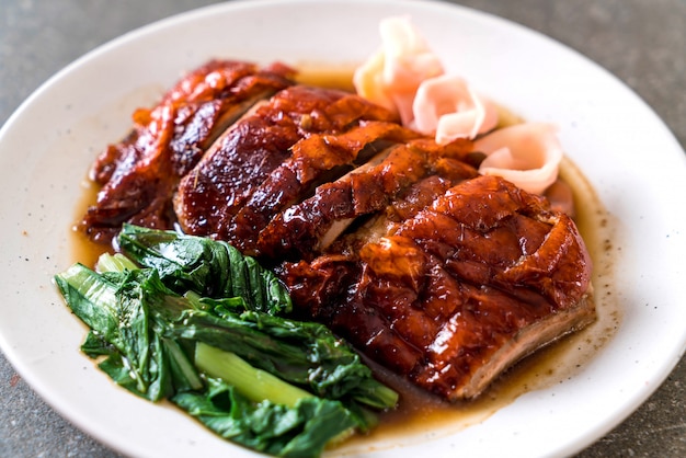 roasted duck on table