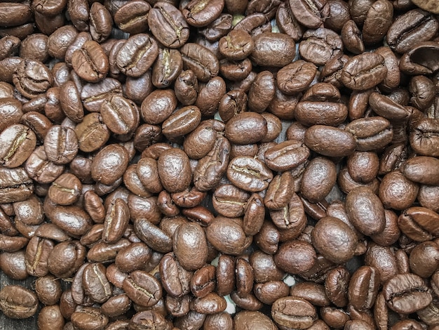 Roasted fresh coffee beans stack.