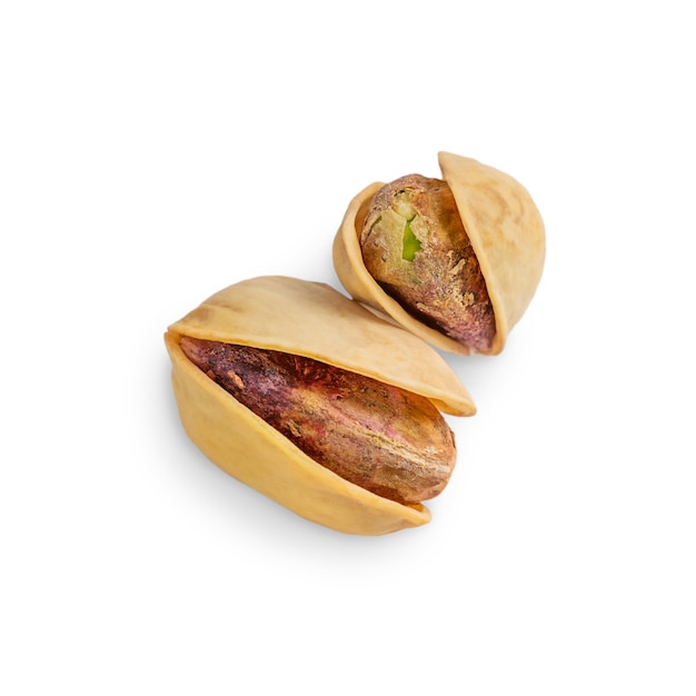 Roasted and salted dry pistachio nuts isolated on white background served as healthy vegan snack