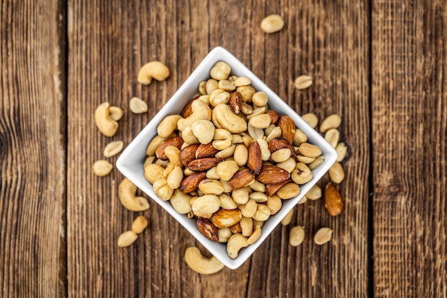 Roasted and salted nuts close up selective focus