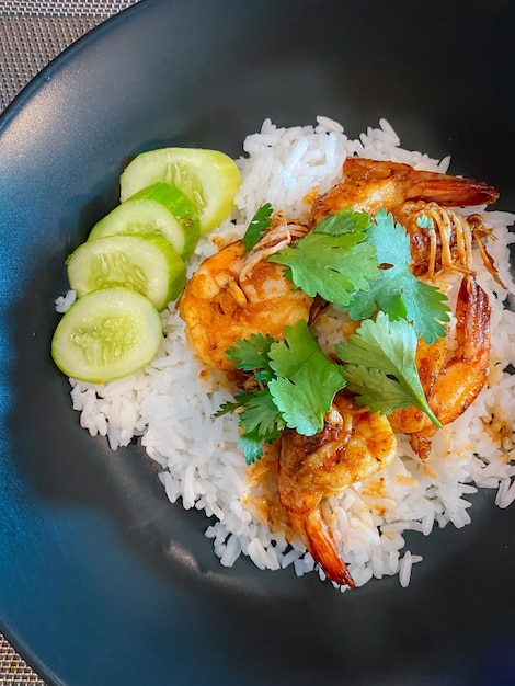 Roasted shrimps with rice on rice