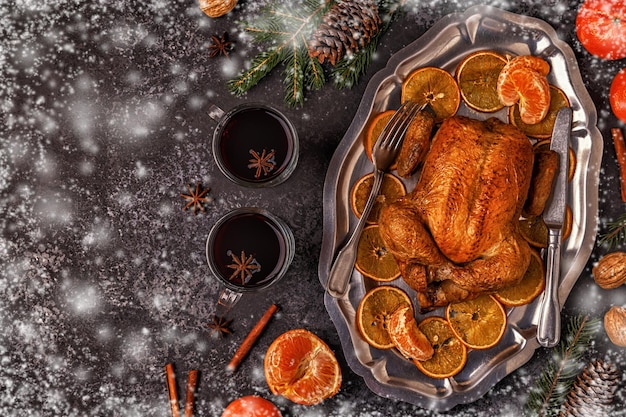 Roasted whole chicken with Christmas decoration