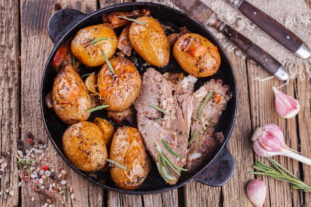 Roasted young potatoes in the pan