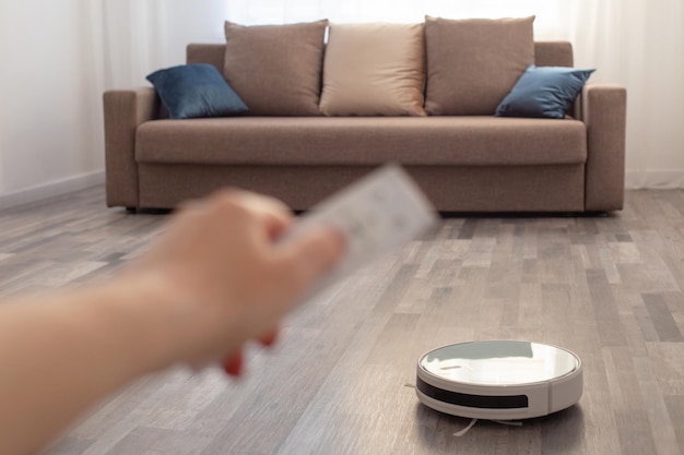 Robot vacuum cleaner on the floor in living room