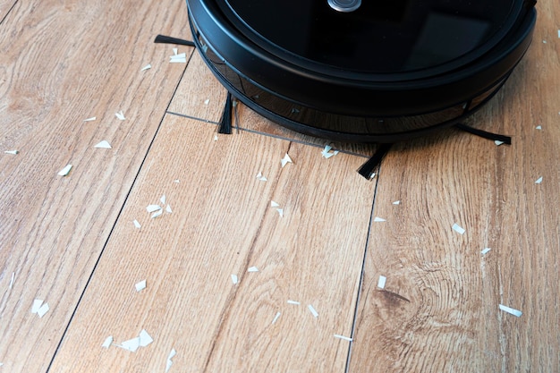 Robotic vacuum cleaner on wood floor smart cleaning technology