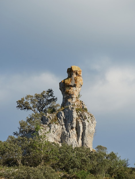 Rock formation in the foreground with cloud background