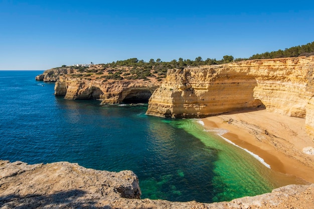 Rock formations and cliffs of Corredoura beach Algarve Portugal