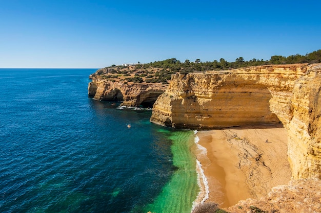 Rock formations and cliffs of Corredoura beach Algarve Portugal