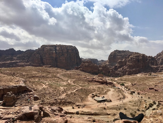 Rock formations on landscape against sky