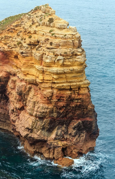 Rock formations near shore. Summer Atlantic rocky coast view (Costa Vicentina, Algarve, Portugal).