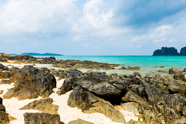 Rocks on the beach in Tropical sea at Bamboo Island Krabi Province