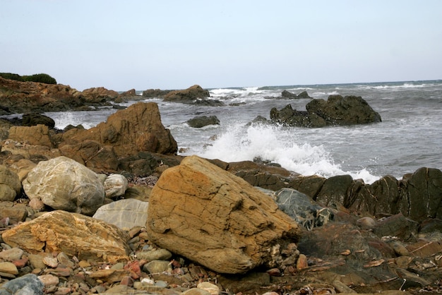 rocks and blue sea, bay in Costa Paradiso, Sardinia Italy