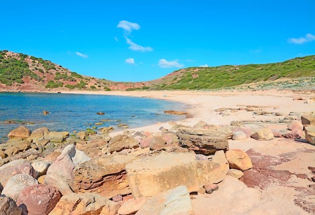 Rocks and sand in Porticciolo coast Sardinia