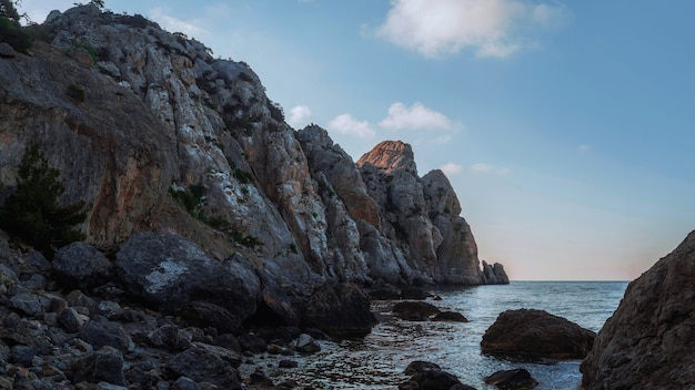 Rocky mountains sinking into the sea