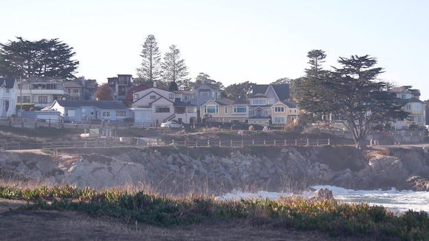 Rocky ocean beach waves crashing monterey california coast beachfront houses