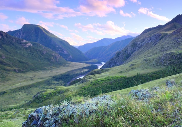 Rocky peaks covered with vegetation Siberia Russia