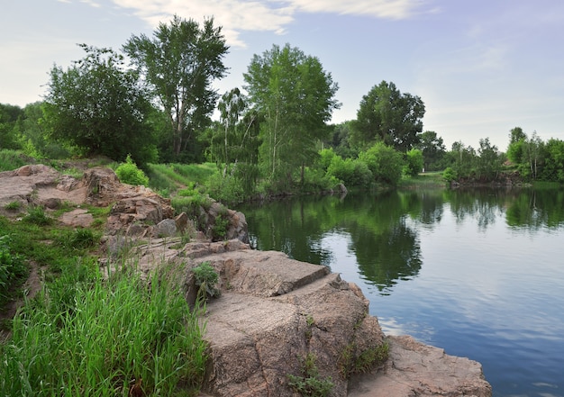 The rocky shore of the lake