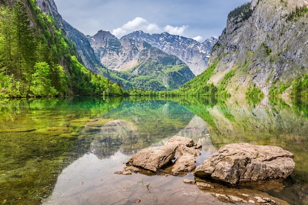 Rocky shore of Obersee lake in Alps Germany Europe