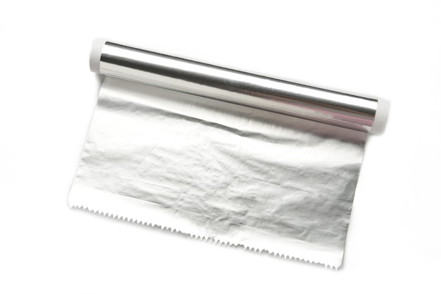 Roll of aluminum foil isolated on white