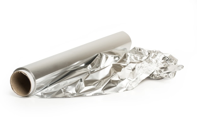 A roll of aluminum paper isolated on a white background