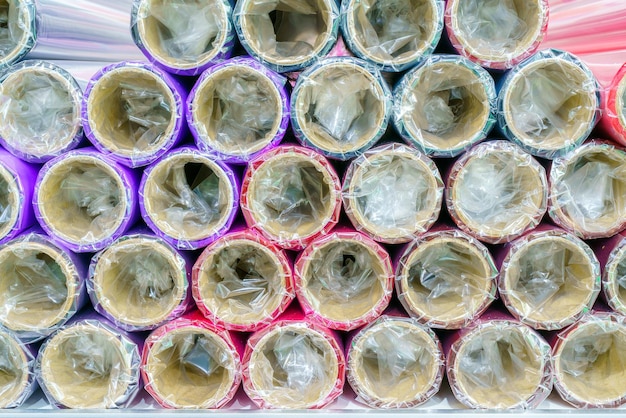 A roll of wrapping paper on a shelf in a store