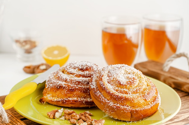 Rolled bun with grated coconut and walnut