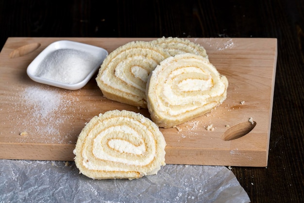 A rolled roll of soft cake and sweet curd filling